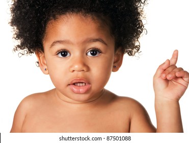 Cute little child showing something