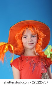 cute little child in a special costume of a Pippi Longstocking