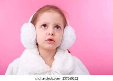 Cute Little Child Wearing Fur Earmuffs