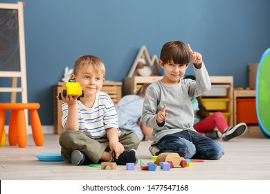 Cute little children playing in kindergarten - Shutterstock ID 1477547168
