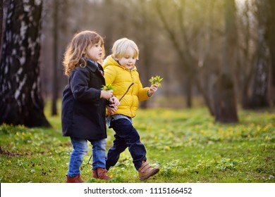 Cute little children playing together. Preschooler boy and girl. Best friends.Toddler siblings together on nature. Kids in sunny spring park