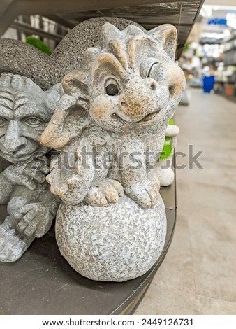 Cute little dragon, garden figurine to decorate the garden