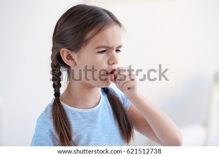 Cute little girl with allergy at home