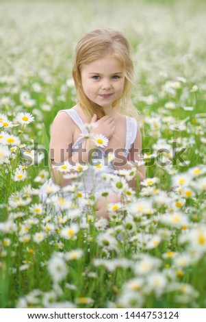 Similar – flower girl Gänseblümchen