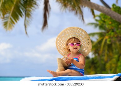 Cute Little Girl In Big Hat On Summer Tropical Beach