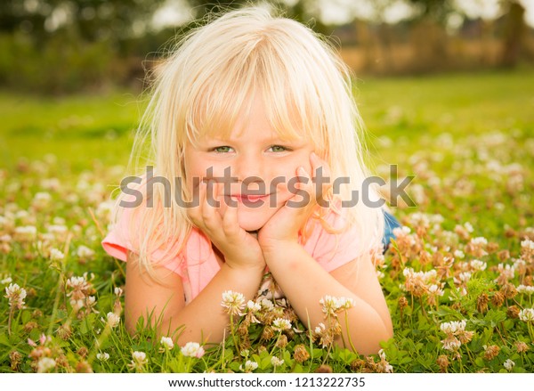Cute Little Girl Blonde Hair Green Stock Photo Edit Now 1213222735