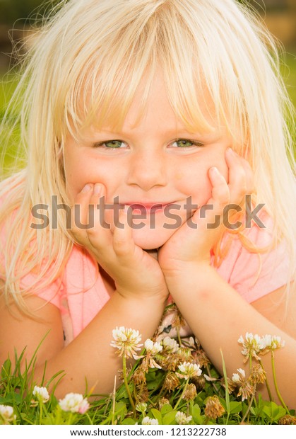 Cute Little Girl Blonde Hair Green Stock Photo Edit Now 1213222738