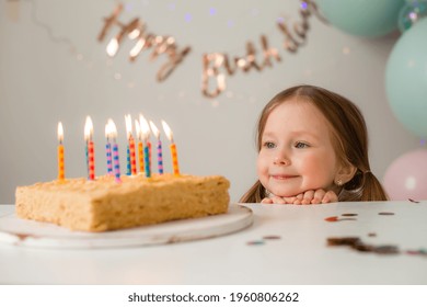 Cute Little Girl Blows Out Candles Stock Photo 1960806262 | Shutterstock