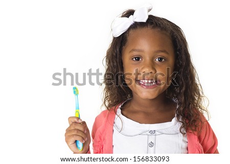 Cute Little Girl Brushing her teeth