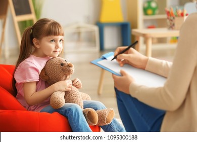 Cute little girl at child psychologist's office