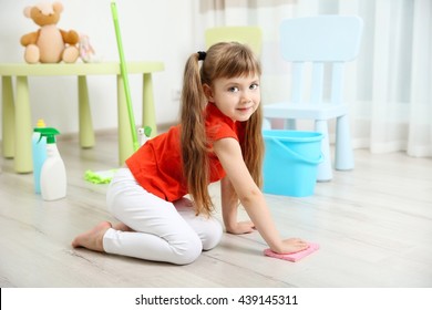 Cute Little Girl Cleaning Her Room