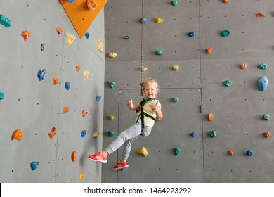 Cute Little Girl In Climbing Gym