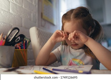 Cute Little Girl Coloring Pictures, Rubs Her Eyes. Tired Eyes, Conjunctivitis, Feeling Of Sand In The Eyes. Concept Of Eye Disease And Strain In Children.