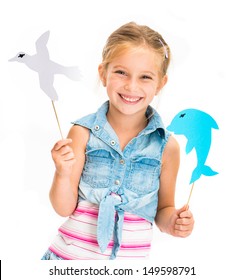 cute little girl with dolphin and gull