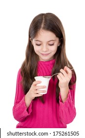 cute little girl eating yoghurt
