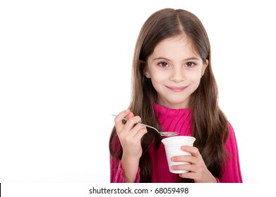 cute little girl eating yoghurt