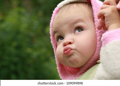 Cute little girl is frowning, face - Shutterstock ID 109099898