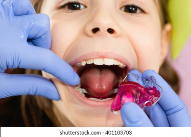 Cute Little Girl Getting Dental Braces