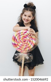 Cute Little Girl With Giant Lollipop