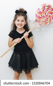 Cute Little Girl With Giant Lollipop