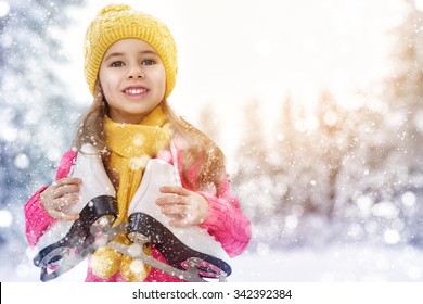 Cute Little Girl Is Going Skate Outdoors