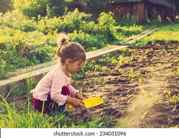 Cute little girl having fun at countryside. Toned - Shutterstock ID 234031096