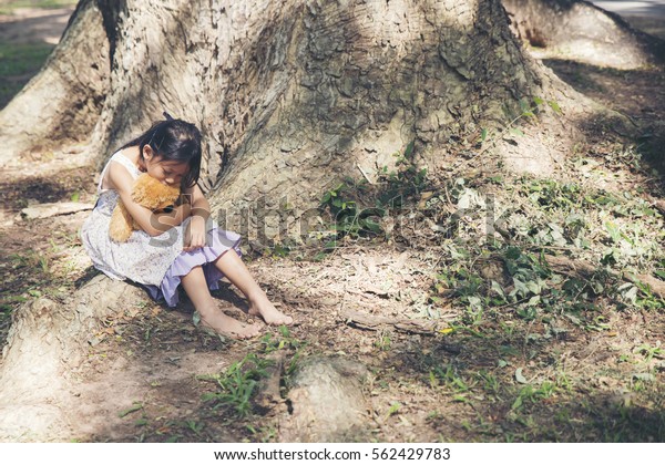 girl hug teddy bear