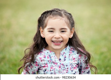 Cute Little Girl Laughing Outside