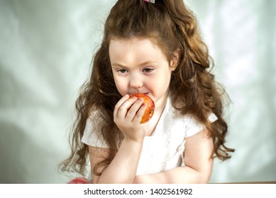 Cute Little Girl Nibbles Apple Pleasure Stock Photo 1402562009 ...