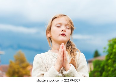 Cute Little Girl Praying