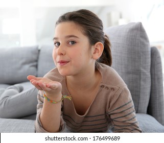 Cute Little Girl Sending Kiss Goodbye