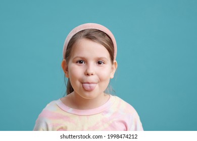 687 School girl showing tongue Images, Stock Photos & Vectors ...