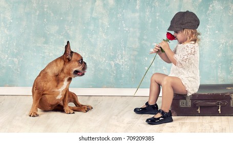 Cute Little Girl Smelling A Red Rose With Her Dog, Retro Style