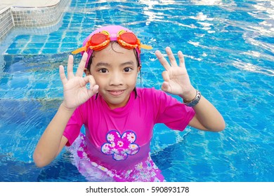 Cute Little Girl Swimming Pool Showing Stock Photo 590893178 | Shutterstock