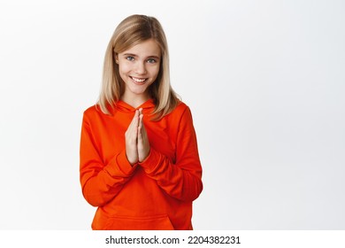 Cute Little Girl, Teen Child Asking For Smth, Begging Parents Buy Toy, Standing In Pleading Coy Pose, White Background. Copy Space