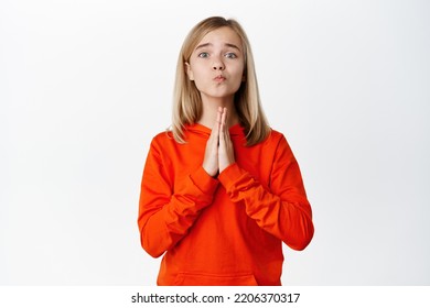 Cute Little Girl, Teen Child Asking For Smth, Begging Parents Buy Toy, Standing In Pleading Coy Pose, White Background. Copy Space