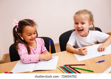 Cute Little Girls Writing Using Pen Stock Photo 724054702 | Shutterstock