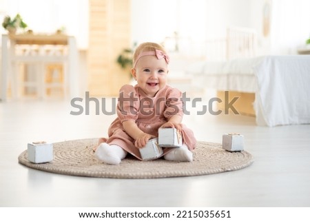 Similar – Image, Stock Photo Portrait of happy cute boy in casuals and straw hat with missing teeth smiling looking at camera and wearing backpack while waiting at airport terminal