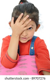 Cute Little Indian Girl Tapping Her Forehead.