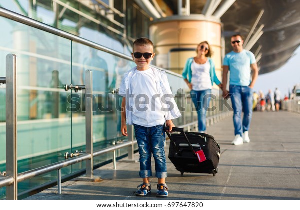 kid with suitcase