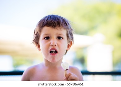 Little Kid Eating Ice Cream Stock Photo (Edit Now) 82352455