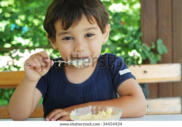 Cute Little Kid Eating Ice Cream Stock Photo 34454434 | Shutterstock