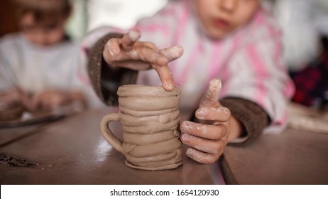 Cute Little Kids Playing Together With Modeling Clay In Pottery Workshop, Craft And Clay Art, Child Creative Activities, Education In Arts