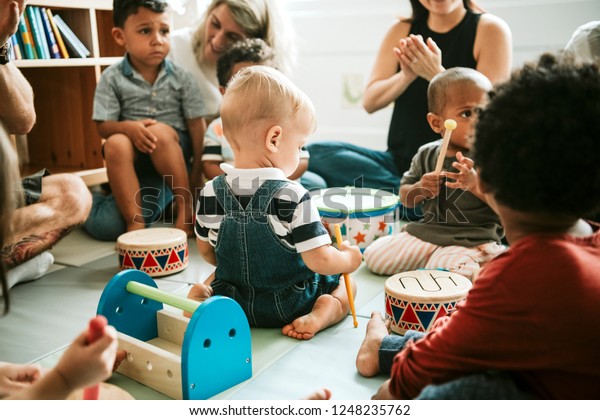 Cute Little Kids Playing Together Stock Photo (Edit Now) 1248235762