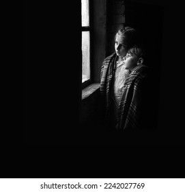 Cute little lone worry pauper waif human face talk see help think dream warm light life. Rural Ukraine dirty dark old house room stand small ill sick teen feel fear hurt pain grief cry tear text space - Shutterstock ID 2242027769