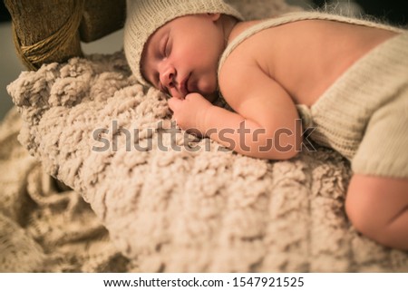 Similar – Baby girl with pompom hat sleeping