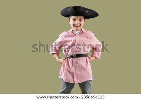 Cute little pirate on green background