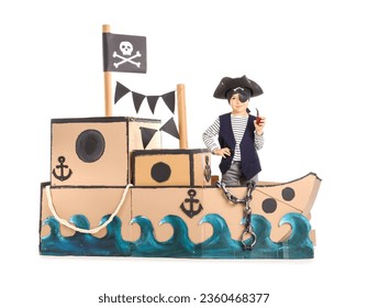 Cute little pirate with smoking pipe in cardboard ship on white background