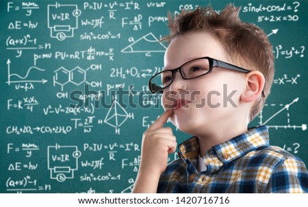 Similar – Happy kid looking at camera through magnifying glass