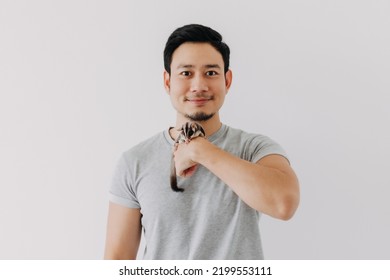 Cute Little Sugar Glider Pet Hold On The Asian Man Owner Isolated On White.